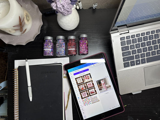 Flat lay of a cozy desk setup with a laptop, coffee cup, notebook, and custom tumbler, creating a warm and creative workspace for personal branding.